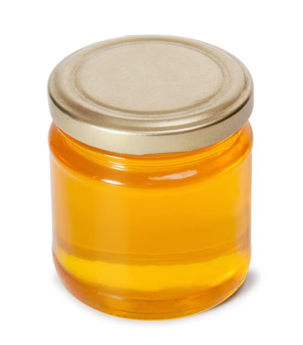 Glass jar full sweet honey isolated white background 259229 174 ezgif.com avif to jpg converter