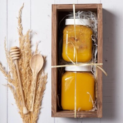 Set jars with honey nuts honey wooden box top view flat lay 150893 8101